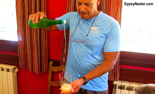 The proper way to pour Basque sidra, pour the cider from as high up as you can!