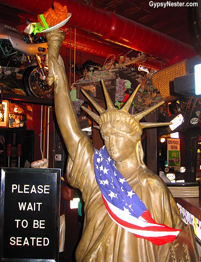 Have you ever wondered about the history of Buffalo Wings? These tasty little morsels of American food lore were invented (by accident, or perhaps neccessity!) by Teressa Bellissimo in the Anchor Bar. The restaurant, still open, in Buffalo, NY is awash in fanciful decor celebrating Teressa's achievement! Pictured is the Statue of Liberty giving her salute! See the full story here!