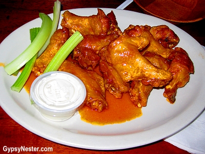 Have you ever wondered about the history of Buffalo Wings? These tasty little morsels of American food lore were invented (by accident, or perhaps neccessity!) by Teressa Bellissimo in the Anchor Bar. The restaurant, still open, in Buffalo, NY is awash in fanciful decor celebrating Teressa's achievement! Pictured is how they are served at the Anchor Bar. See the full story here!