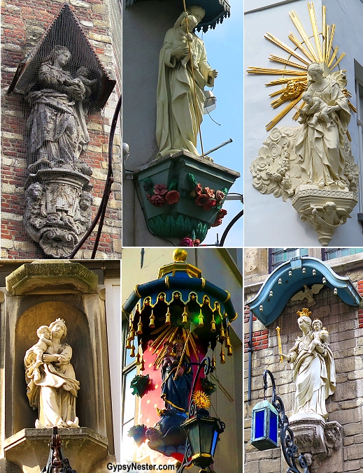 Statues of Mary on the buildings in Antwerp, Belgium. Legend says that these statues were erected to ward off evil beings like the giant Lange Wapper