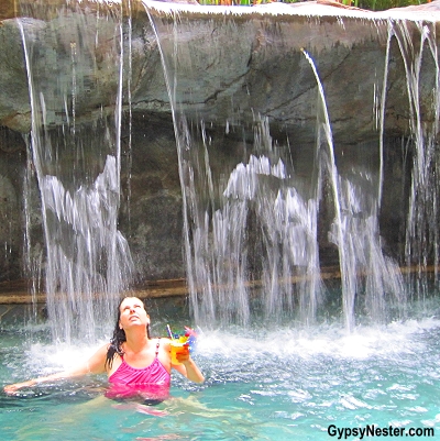 Veronica enjoys a pina colada under a waterfall at Baldi Hot Springs Resort in La Fortuna, Costa Rica