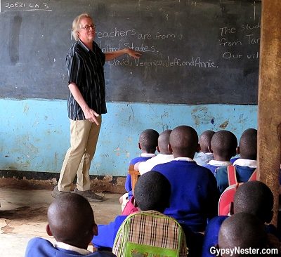 David wears his Bluffworks Travel Pants while volunteering in a classroom in Tanzania, Africa