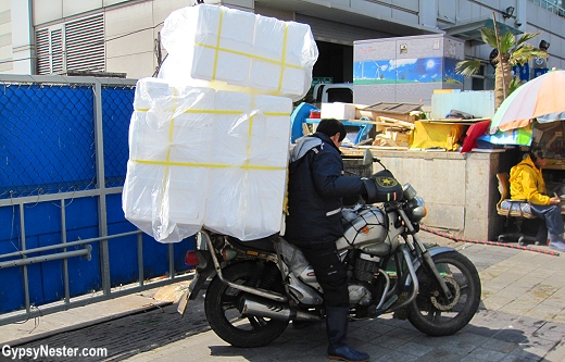 Amazing amounts of stuff are loaded on motorcycles in Buson, South Korea