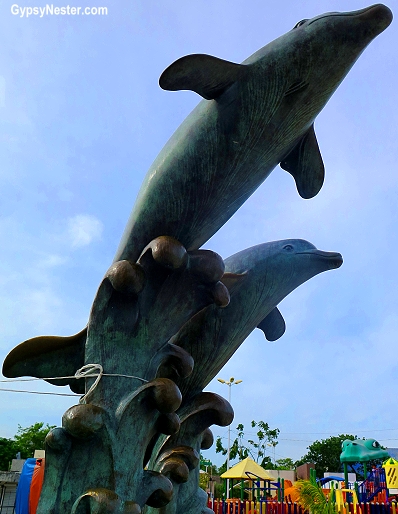 Dolphin statue in Parque de las Palapas, Cancun, Mexico