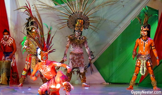 Traditional Mayan dancers perform in Parque de las Palapas, Cancun, Mexico
