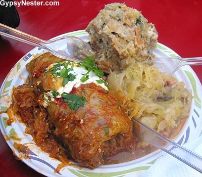 töltött káposzta, cabbage stuffed with meat and rice and served with a paprika sauce and sour cream. Exceedingly Hungarian! We also couldn't resist a huge smoked meat dumpling with sauerkraut.