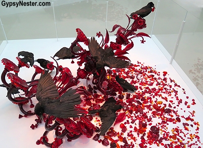 Carroña, where the artist, Javier Pérez, intentionally dropped a huge chandelier and taxidermied crows pick over the broken shards. At the Corning Museum of Glass in New York