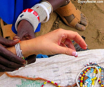 Making beaded necklaces, bracelets, and earrings has long been a tradition for the Maasai. Originally they made their own beads, then they began trading with European colonists for them.