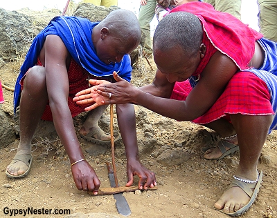 Maasai men make fire by spinning a stick placed on a dry branch. The friction generates enough heat to create embers that are placed in dry donkey dung. With a bit of blowing, flames appear!