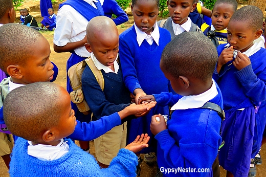 We were moved by this small child in Tanzania who had a tiny ball of rice. Instead of eating it by herself, she shared with many other children