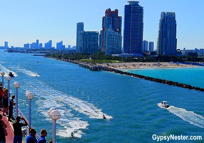 Jet skiers jumping the wake of our cruise ship in Florida