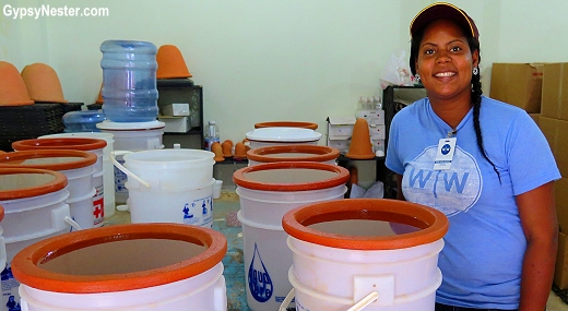 Making water filters in the Dominican Republic with Wine to Water on Fathom Cruises