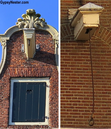 In Amsterdam, because the houses are so tall and skinny, almost every house has hoisting beams attached above the highest windows. This way furniture or heavy repair materials can be pulled up and brought inside through a large window. Think piano movers in an old silent movie, that's the idea