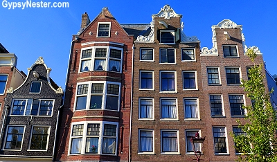 In Amsterdam, the propensity for the older buildings to slant every which way. The land is very soft, so in order to build wooden pilings had to be set deep into the soil to reach more solid ground. But these have settled over time and left some crazy crooked structures!