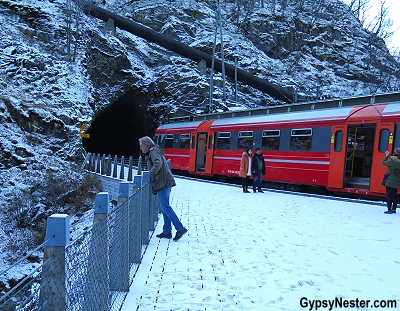 The railway down to the little town of Flåm is a scenic and engineering marvel. The twenty kilometers are some of the steepest tracks in the world, dropping nearly three thousand feet through twenty tunnels