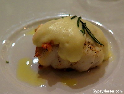 brosme, a fish much like cod, that is prepared with foam of potato, deep fried rosemary, and almonds at Havsmak in Oslo, Norway