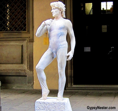 Human statue of David in Florence, Italy