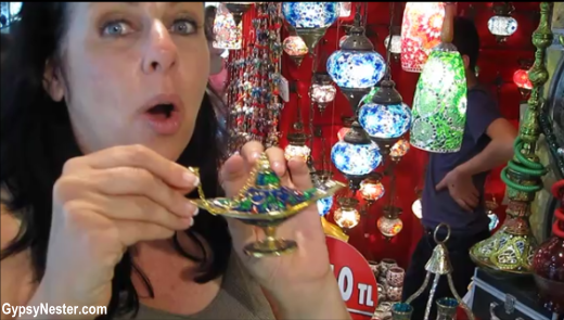 Veronica rubs a magic lantern at the Grand Bazaar in Istanbul, Turkey