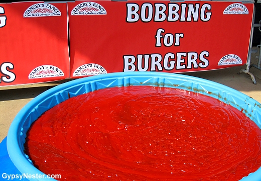 A kiddy pool full of catsup? Bobbing for Burgers at the Hamburger Festival of Akron, Ohio