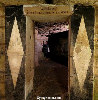 The entrance to the catacombs in Paris: Stop! This is the Empire of Death