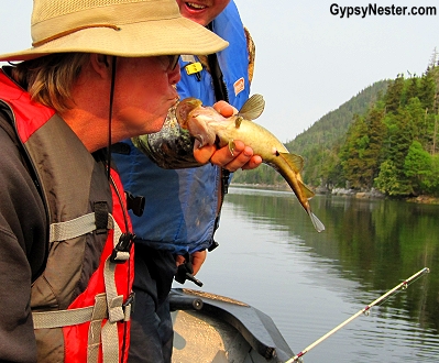 David kisses the cod in Newfoundland GypsyNester.com