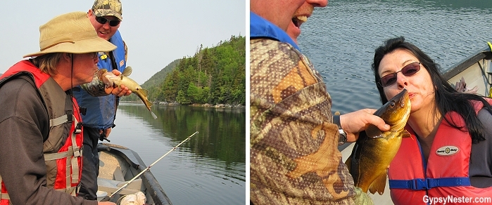 Kissing our freshly caught cod in Bay of Islands Newfoundland with Four Seasons Tours