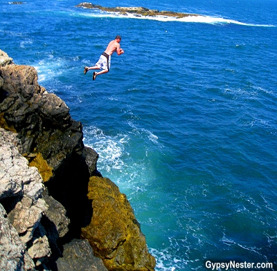 Diving off the sea cliffs in Newport, Rhode Island