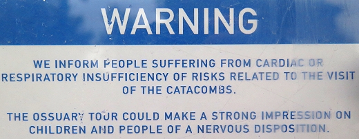 The warning sign outside the Paris Catacombs