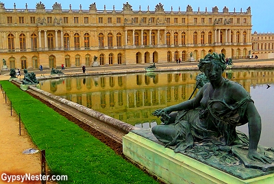 The Palace of Versailles from the gardens near Paris, France - GypsyNester.com