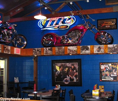 Motorcycles hang from the ceiling at Poopy's in Savanna Illinois