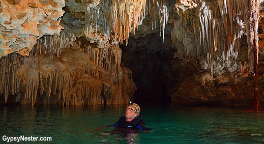 David floats down Rio Secreto in Playa del Carmen, Mexico! GypsyNester.com