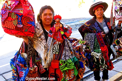 Ladies hawking their wares at the train station to Machu Picchu