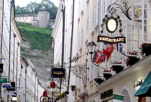 Charming Salzburg street with guild signs