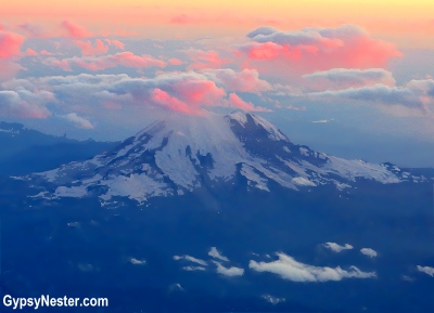 Spectacular sunset over Mount Rainier from an airplane