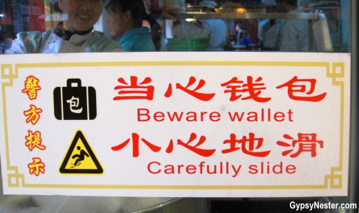 Funny sign at Nanxiang Steamed Bun Restaurant in Shanghai China's Old City