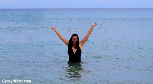 Veronica swims in the ocean off the coast of Sicily, Italy! GypsyNester.com