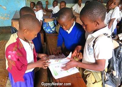 At the primary school in the village of Rau, Tanzania, there is one workbook for every six children. With Discover Corps in Africa