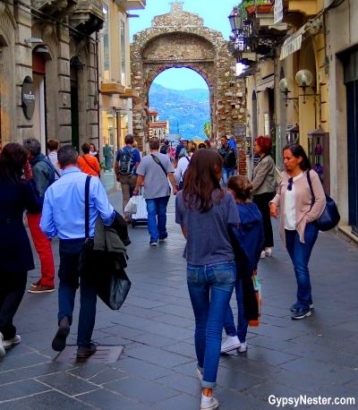 Inside the ancient walls, Taormina, Sicily thrives as a major destination for tourists from all over the world.