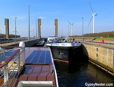 Riding a river cruise ship through the locks of Holland