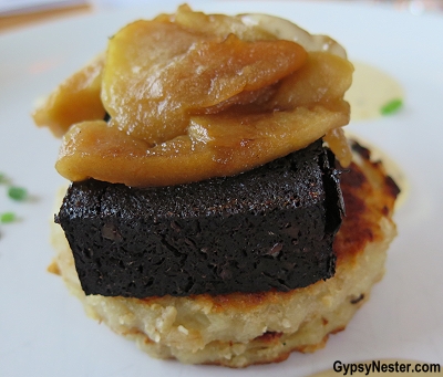 Black pudding atop a potato pancake with glazed apples at Gorman's Clifftop House along the Wild Atlantic Way in Ireland