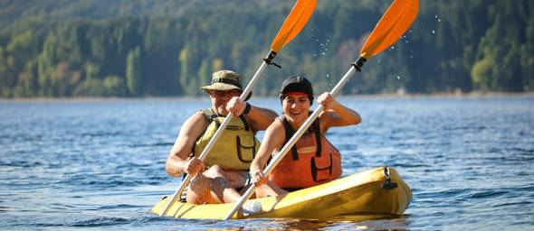 Couple enjoying a romantic kayaking experience on Sydney Harbour